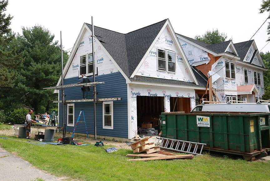 Attached garage with a finished loft above, built in New Hampshire